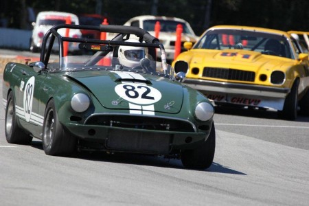 Here comes the Havy Metal! - Doug Yip ('67 Sunbeam Tiger) leads Dennis Repel ('74 Chevrolet Camaro) and the rest of the pack in the 2012 BCHMR. - Brent Martin photo