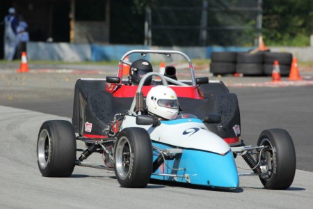 VRCBC president Tedd McHenry (Xpit F4) holds off (ahem) newly-elected SCCBC presdient, Ray Stec (Royale RP37) during the July 2014 race weekend at Mission. - Brent Martin photo