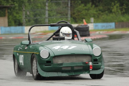 John Elliott (1969 MGB) splashes around the track. - Brent Martin photo