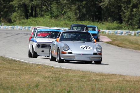 Vintage racing newcomer, David Hogg (Porsche 911) leads veteran Ian Thomas (BMW 2002) and Jorge Montesi (Austin Cooper S), Peter Valkenburg (Volvo PV544) and 2012 REVS Champion Paul Haym (Datsun 510) - Brent Martin photo