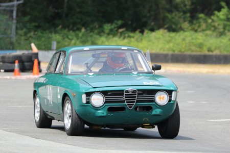 Roger van der Marel exiting Turn 9 in his beautiful 1967 Alfa Romeo GTV. - Brent Martin photo